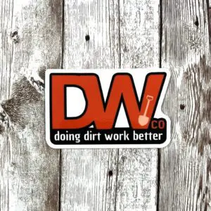 DW Doing Dirt Work Better logo sticked on the wooden board