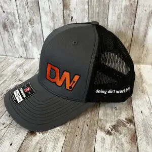 A grey and black colored snap back cap with DW Logo